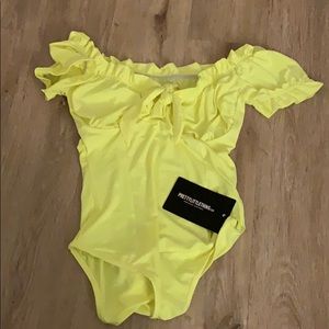 Neon yellow Body suit by Pretty Little Thing
